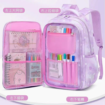 Pink backpack with multiple pockets containing stationery items on a white background