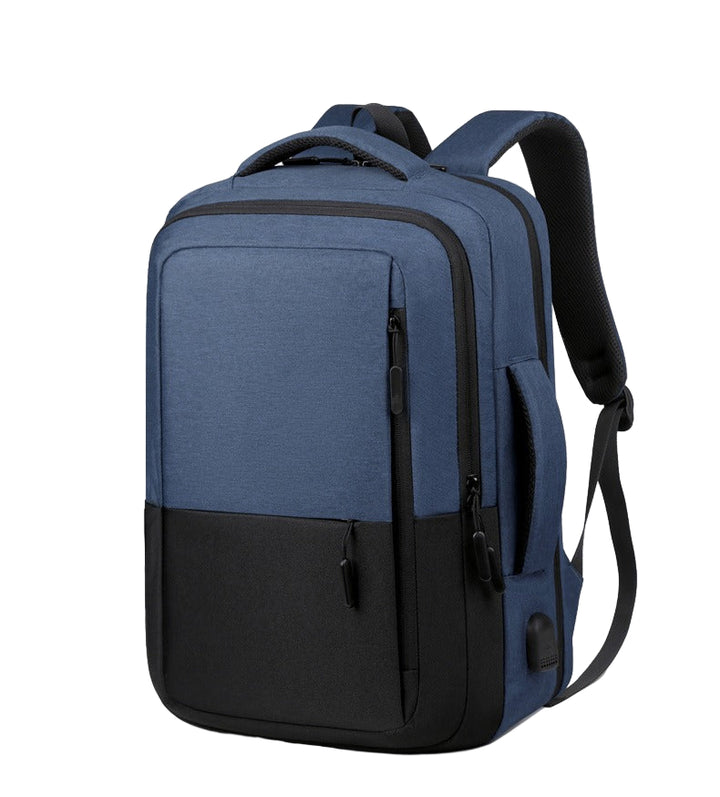 Blue and black backpack on a light gray background
