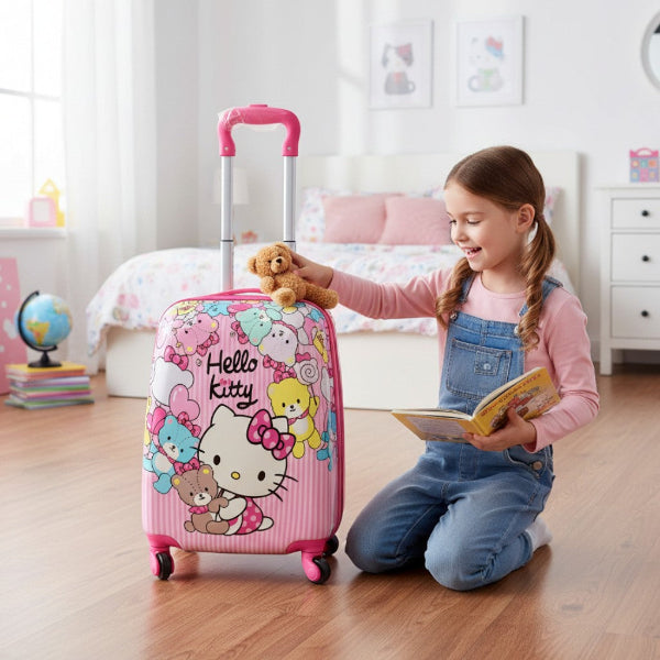 Child with a Hello Kitty suitcase in a bedroom